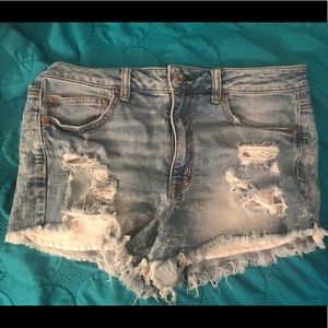 High rise distressed denim shorts